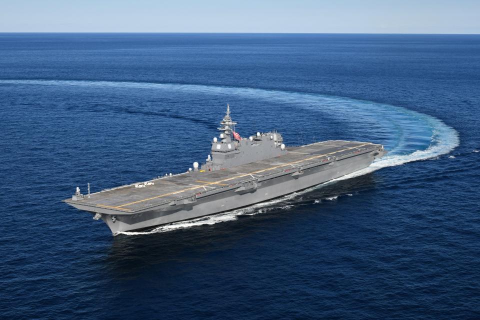 Japan's converted Izumo-class helicopter carrier, Kaga, now upgraded to be an aircraft carrier, turning on the open ocean.