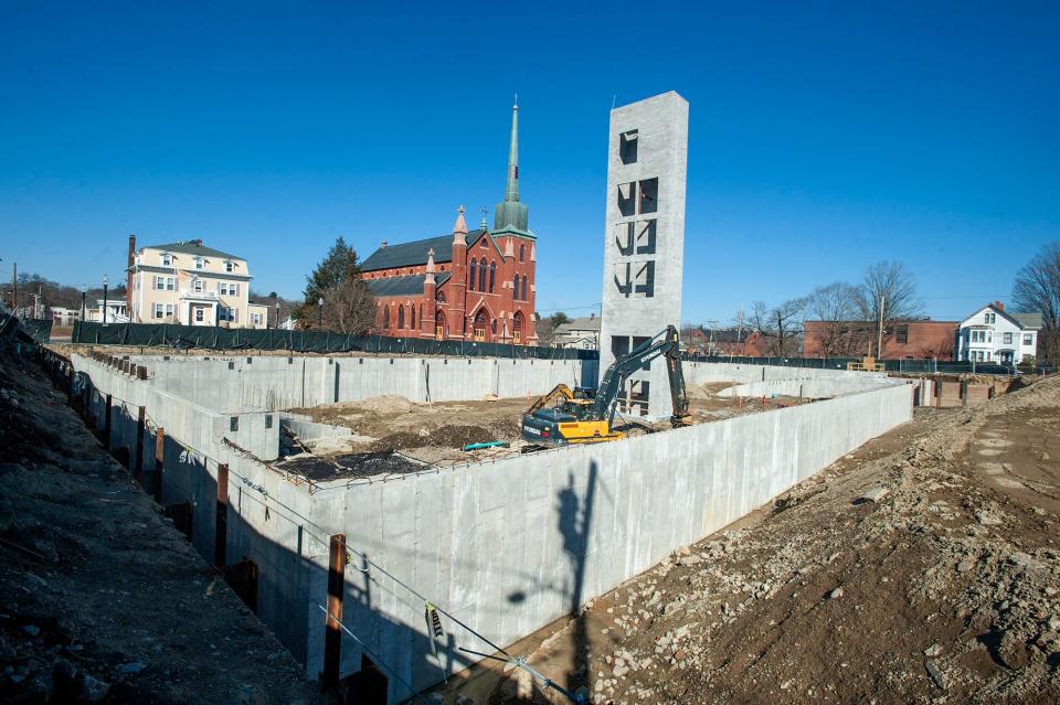 Construction is underway at 59 East Central St. in Natick, March 1, 2024. This development is part of the town's Center Gateway Zoning District, which was adopted last year to get Natick closer to accommodating MBTA zoning requirements.