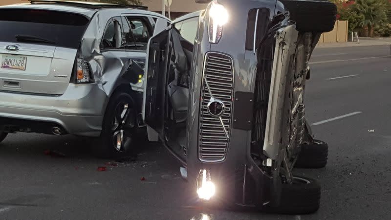 A self-driven Volvo SUV owned and operated by Uber flipped on its side after a collision in Tempe, Arizona. Courtesy FRESCO NEWS/Mark Beach