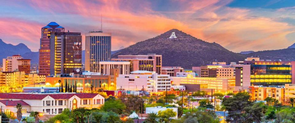 Tucson, Arizona, USA downtown skyline with Sentinel Peak at dusk. (Mountaintop 
