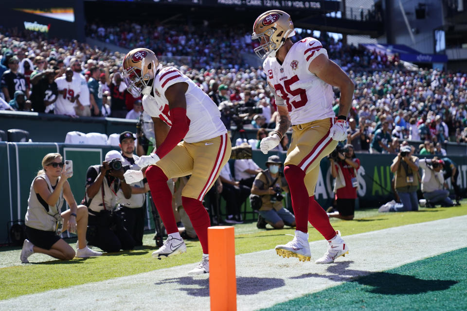 San Francisco 49ers wide receiver Jauan Jennings (15) celebrates a touchdown with teammate George Kittle (85) during the first half of an NFL football game against the Philadelphia Eagles on Sunday, Sept. 19, 2021, in Philadelphia. (AP Photo/Matt Rourke)