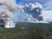 <p>A view of the Parker Lake wildfire near Fort Nelson, B.C. is shown on Monday, May 13, 2024 in a BC Wildfire Service handout photo. British Columbia's wildfire service says there's potential for gusty winds to fan aggressive fire behaviour in the north, where out-of-control have forced several thousand people to leave their homes.</p> 