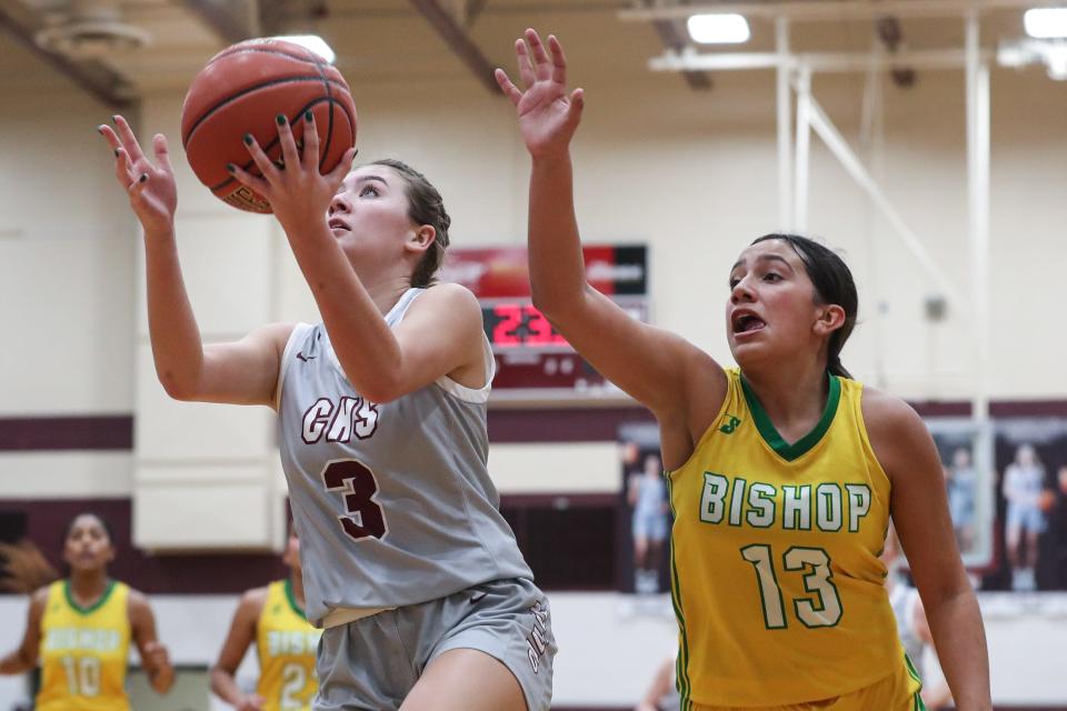 Calallen's Karlie Haigood attempts a basket during a game against Bishop on Tuesday, Dec. 12, 2023, in Corpus Christi, Texas.