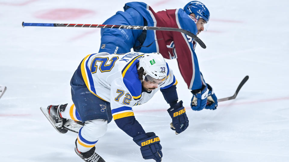 DENVER, CO - MAY 19: St. Louis Blues defenseman Justin Faulk (72) and Colorado Avalanche center Nazem Kadri (91) collide in the third period on a play that would result in a match penalty in the third period during a Stanley Cup Playoffs first round game between the St. Louis Blues and the Colorado Avalanche at Ball Arena in Denver, Colorado on May 19, 2021. (Photo by Dustin Bradford/Icon Sportswire via Getty Images)