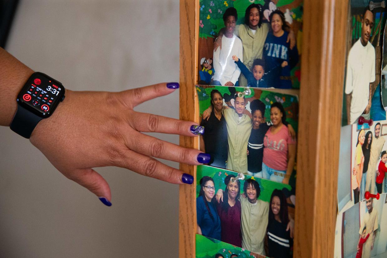 Nakia Dalton points out a wall of photos from different visits to her incarcerated son, Deante Dalton, on Wednesday, June 12, 2024, at Nakia's home in Elkhart.