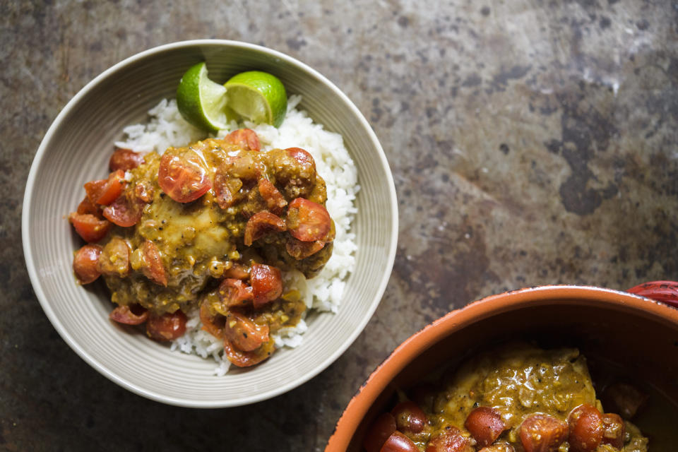 This image released by Milk Street shows a recipe for Colombian coconut braised chicken. (Milk Street via AP)