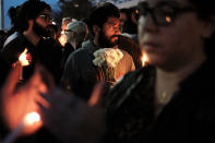 <p>People converge with candles for a vigil to walk along a bike path in Lower Manhattan on Nov. 2, 2017 in New York City. (Photo: Spencer Platt/Getty Images) </p>