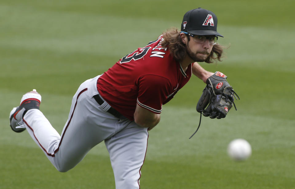 SCOTTSDALE, ARIZONA - FEBRUARY 28: Starting pitcher Zac Gallen #23 of the Arizona Diamondbacks throws prior to the Cactus League spring training baseball game against the Colorado Rockies on February 28, 2021 in Scottsdale, Arizona. (Photo by Ralph Freso/Getty Images)