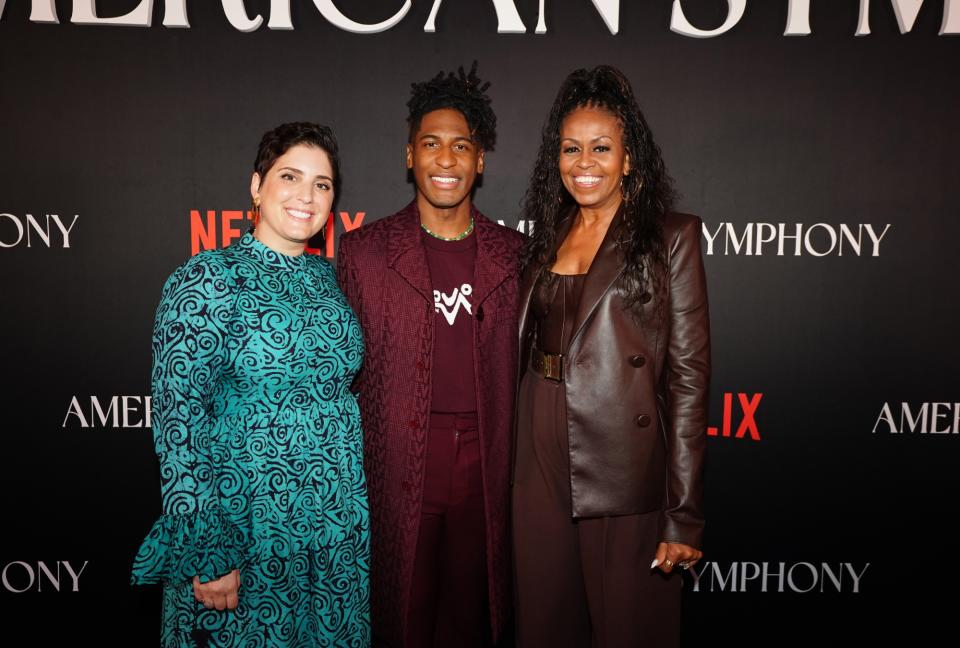(L-R) Suleika Jaouad, Jon Batiste, and Michelle Obama attend the American Symphony New Orleans Premiere on December 07, 2023