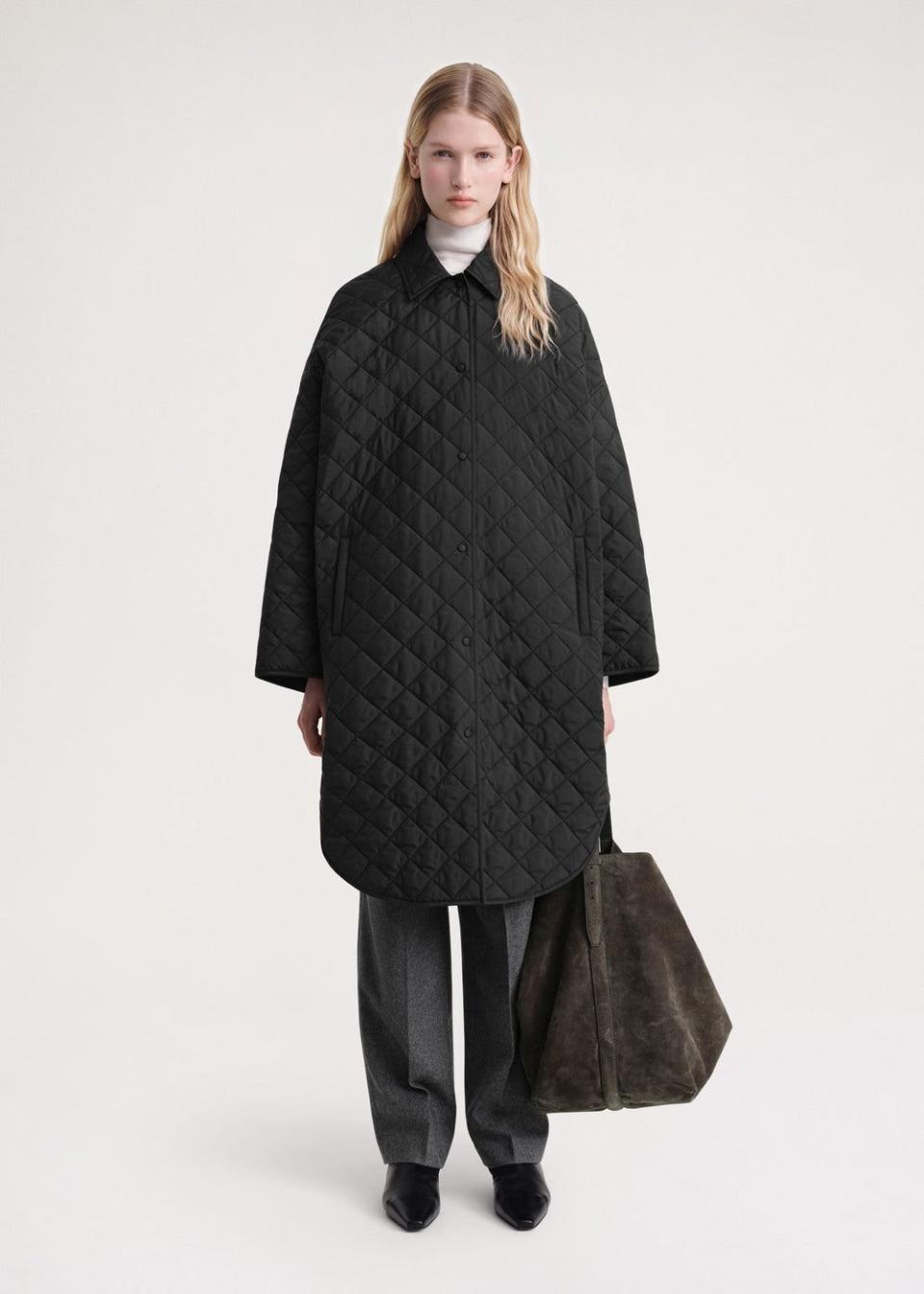 <p><a href="https://toteme.com/products/quilted-cocoon-coat-black" rel="nofollow noopener" target="_blank" data-ylk="slk:Shop Now;elm:context_link;itc:0;sec:content-canvas" class="link ">Shop Now</a></p><p>Quilted Cocoon Coat</p><p>toteme.com</p><p>$820.00</p><span class="copyright">Toteme</span>