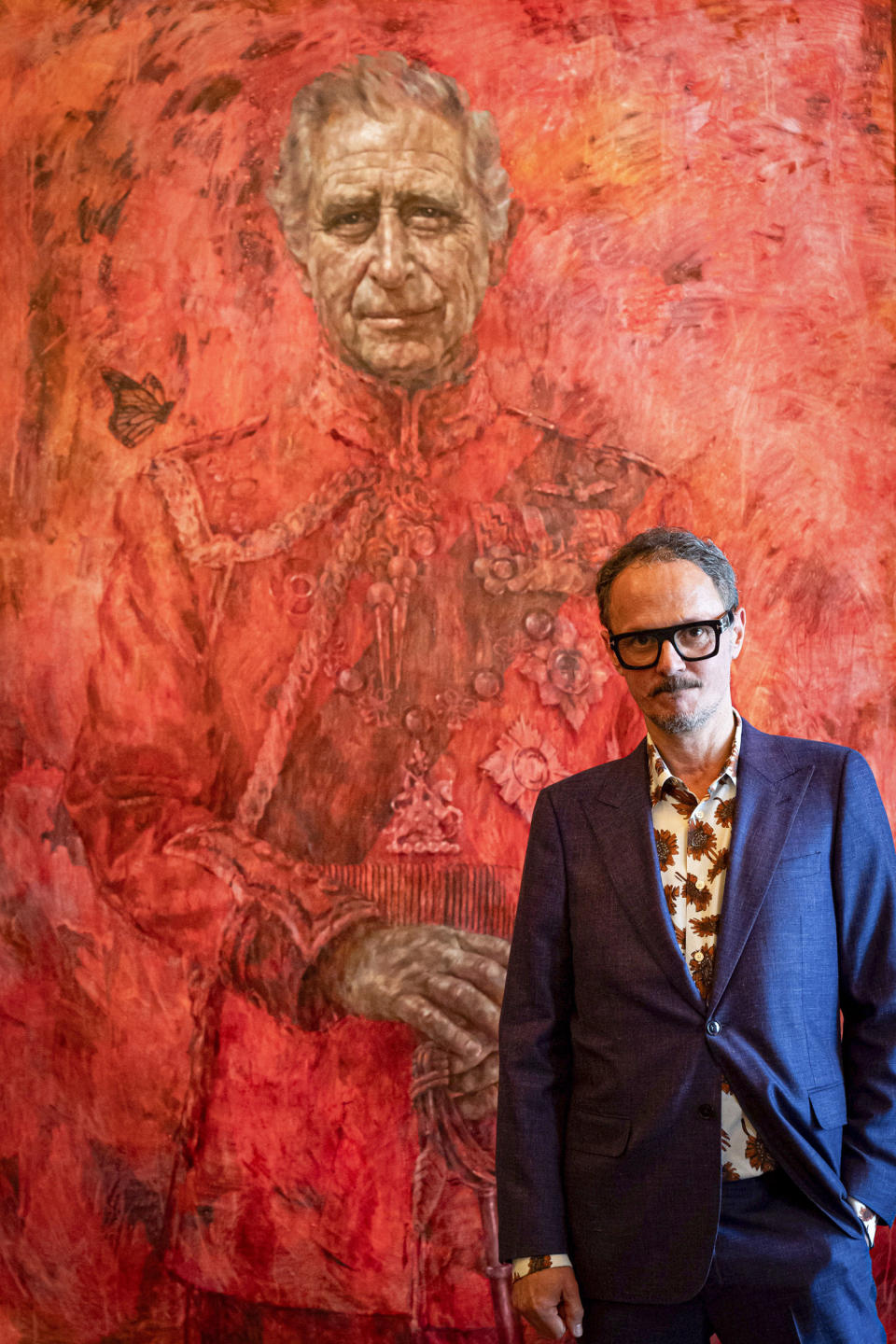 Artist Jonathan Yeo in front of the portrait of King Charles. (Aaron Chown / AP)