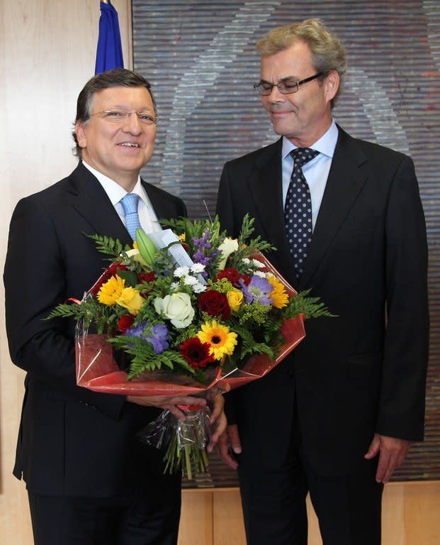 European Union Commission President Jose Manuel Barroso (L) receives flowers from Norway's Ambassador to the EU Atle Leikvoll after the EU was awarded the 2012 Nobel Peace Prize in Brussels in October 2012. The award risks losing some of its lustre because of the prize committee's unexpected and controversial choices of late, some observers warn