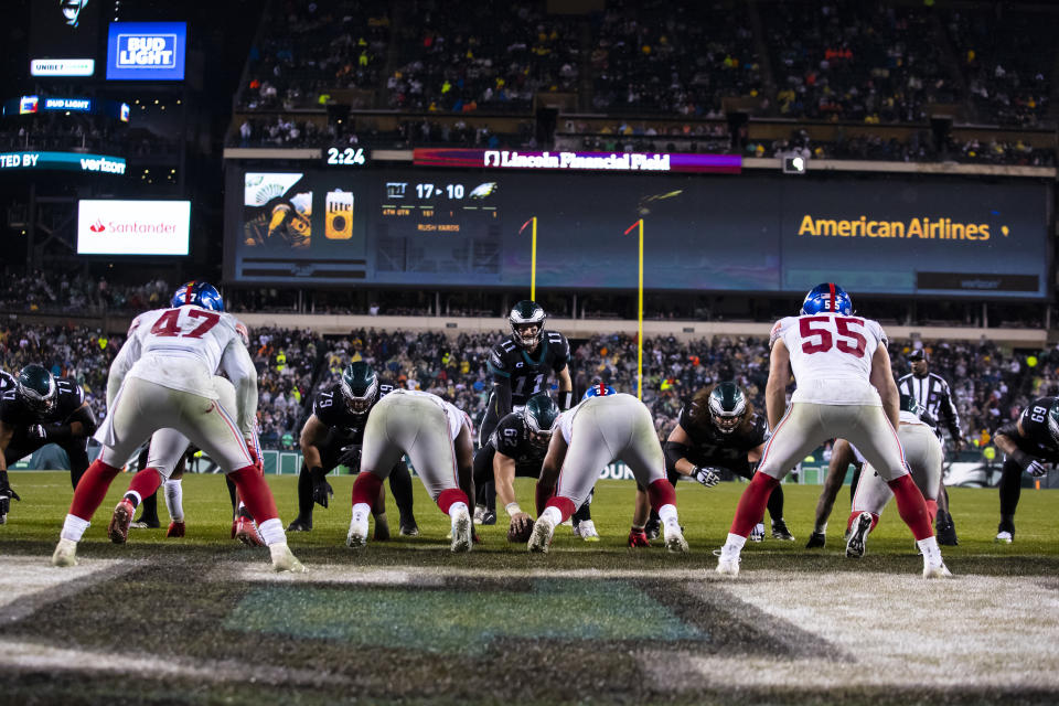 PHILADELPHIA, PA - DECEMBER 09:  Carson Wentz #11 of the Philadelphia Eagles calls a play from the line of scrimmage during the fourth quarter against the New York Giants at Lincoln Financial Field on December 9, 2019 in Philadelphia, Pennsylvania. Philadelphia defeats New York in overtime 23-17.  (Photo by Brett Carlsen/Getty Images)