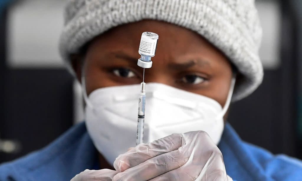 A nurse prepares the Pfizer Covid-19 vaccine