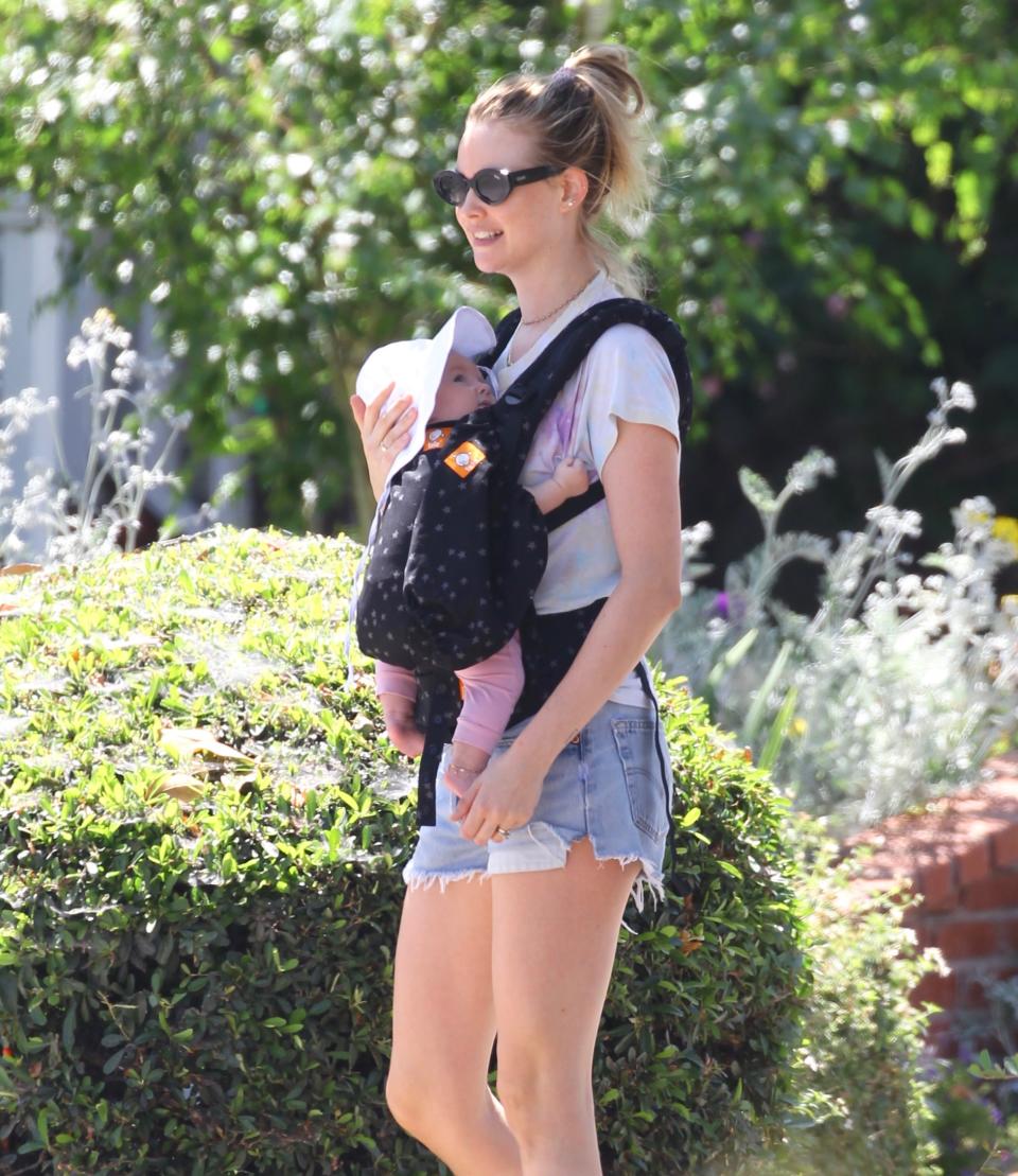 Exclusive: Behati went casual wearing a white t-shirt and denim mini shorts. Source: Mega