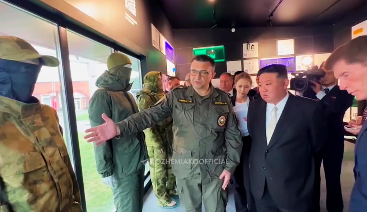 Kim Jong Un visits an exhibition of military equipment, uniforms and weapons in Vladivostok on Sunday (Oleg Kozhemyako via AP)