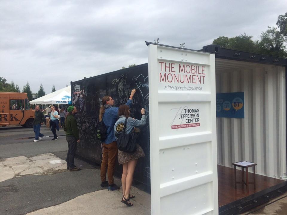 <a href="http://tjcenter.org/free-speech-monuments/" target="_blank">The Mobile Monument Project</a>&nbsp;is a roving installation that began&nbsp;in&nbsp;2015. The&nbsp;shipping container's outside is a chalkboard on which participants&nbsp;can express themselves freely. The inside is an evolving gallery of First Amendment history, which is updated to incorporate specific cases relevant to each of the mobile monument's destinations and audiences. (Photo: Clay Hansen)