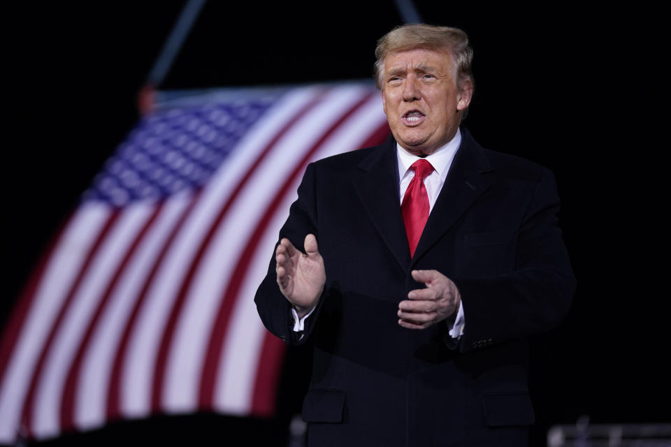 President Donald Trump speaks during a campaign rally for Sen. Kelly Loeffler, R-Ga., and David Perdue at Dalton Regional Airport, Monday, Jan. 4, 2021, in Dalton, Ga. (AP Photo/Evan Vucci)