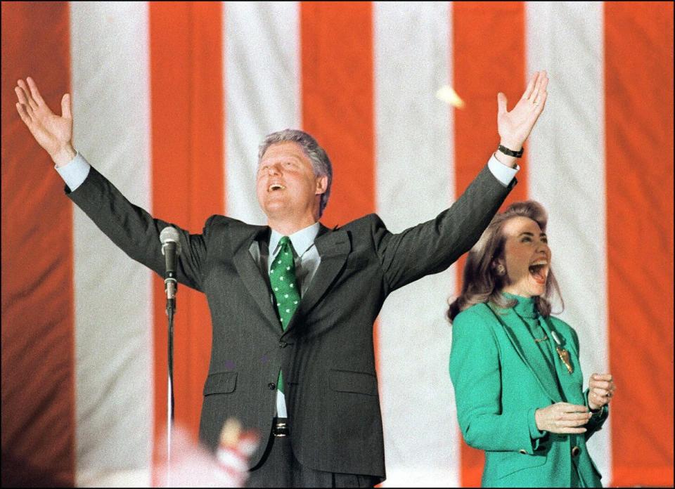 Bill and Hillary Clinton celebrate after winning the Illinois primary, March 1992.