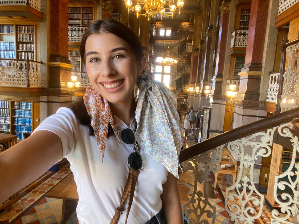 Des Moines Register reporter Paris Barraza takes a selfie inside the Iowa State Capitol Law Library in Des Moines on Sept. 8, 2023.