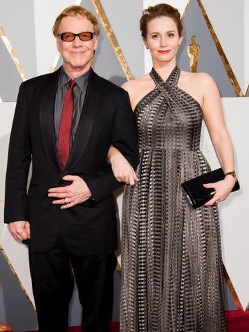 <p>Storms Media Group / Alamy</p> Danny Elfman and Bridget Fonda at the 88th Annual Academy Awards