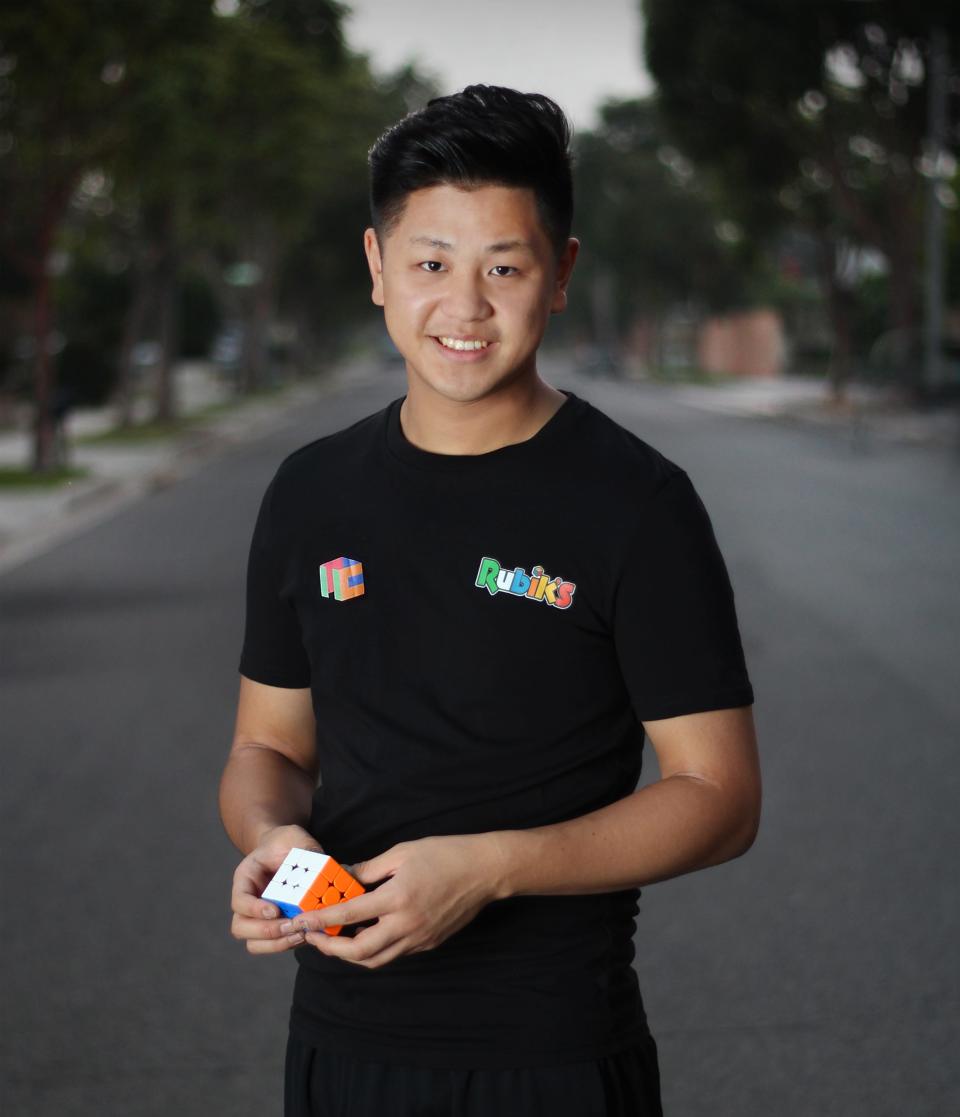 Max Park pictured holding a Rubik's Cube