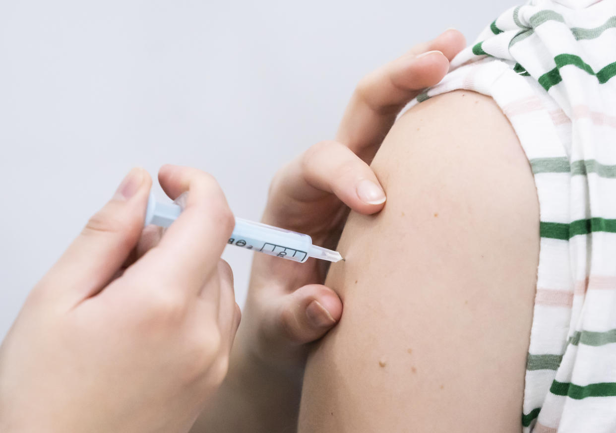 A booster coronavirus vaccine is administered at a Covid vaccination centre at Elland Road in Leeds, as the booster vaccination programme continues across the UK. Picture date: Tuesday December 21, 2021.