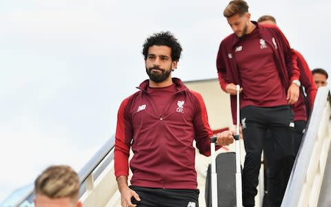 Mo Salah steps off the plane in Kiev - Credit: Getty images