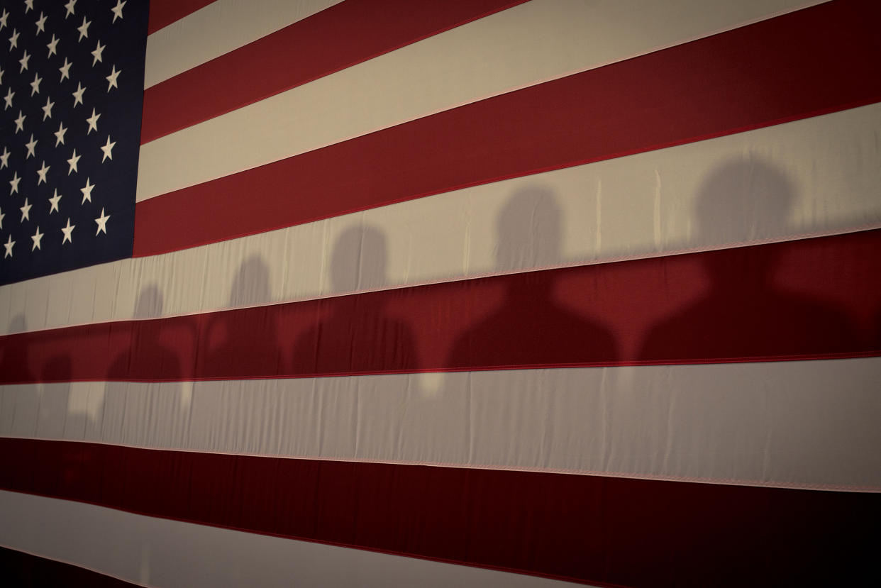 Shadows on an American Flag at Cedar Rapids Town Hall with Kamala Harris in Cedar Rapids, Iowa, Sept. 19, 2019