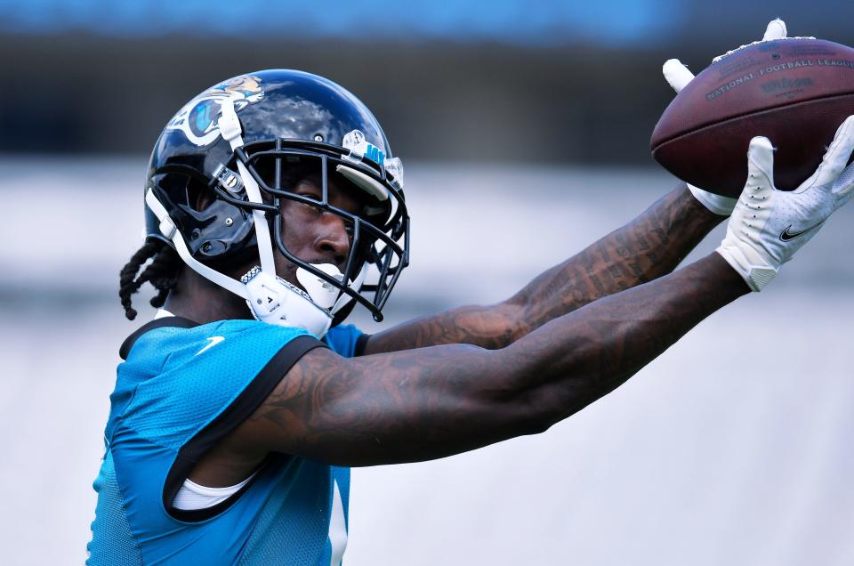 Jaguars wide receiver Calvin Ridley (0) pulls in a pass as he worked with teammates at Monday's preseason camp session.