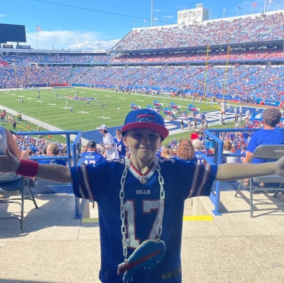 Carson Gaspar, 7, the self-proclaimed "Bills Kid" whose weekly YouTube videos pump up the Bills Mafia fanbase, at a game earlier this season. He and his family were watching the "Monday Night Football" game between the Bills and the Bengals on Jan. 2, 2023, when Bills safety Damar Hamlin went into cardiac arrest after what appeared to be a routine tackle. The NFL suspended the game after Hamlin was taken by ambulance to a Cincinnati trauma center.