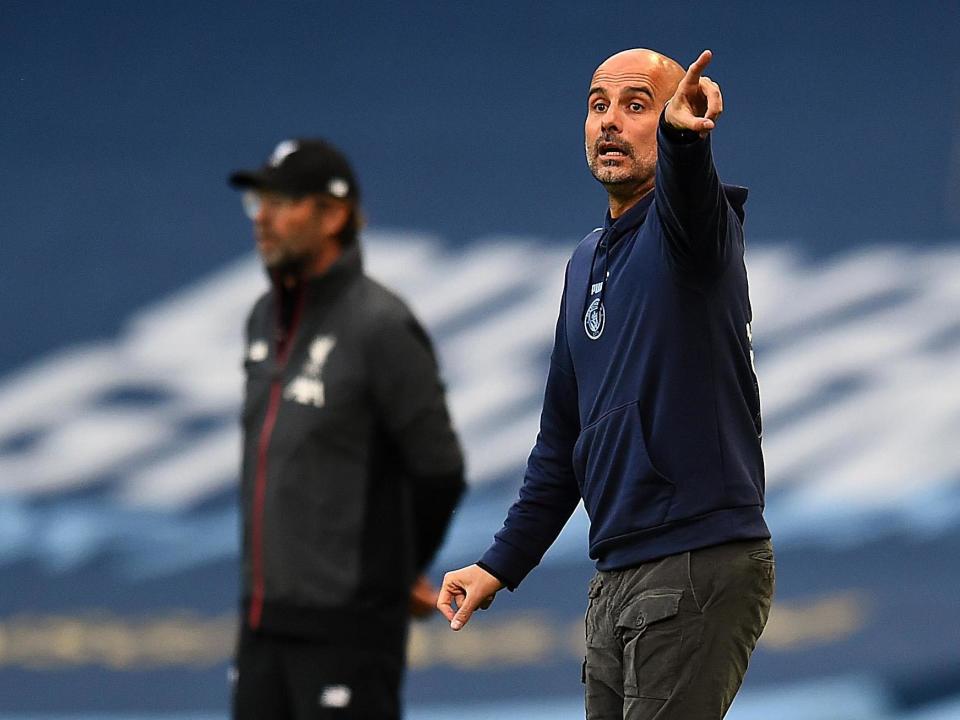 Manchester City manager Pep Guardiola and Liverpool's Jurgen Klopp: Liverpool FC via Getty Images