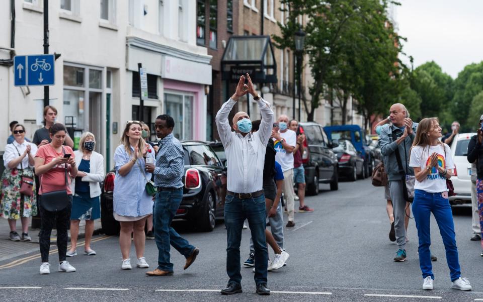 People clap for key workers outside Chelsea and Westminster Hospital  - Barcroft Media