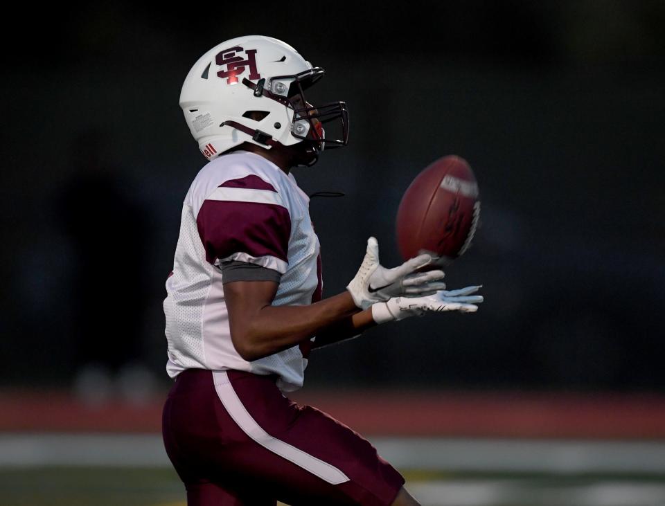 Snow Hill's Jayceere Fields (5) catches the kickoff against Decatur Thursday, Oct. 27, 2022, in Berlin, Maryland. The Seahawks defeated the Eagles 49-6.