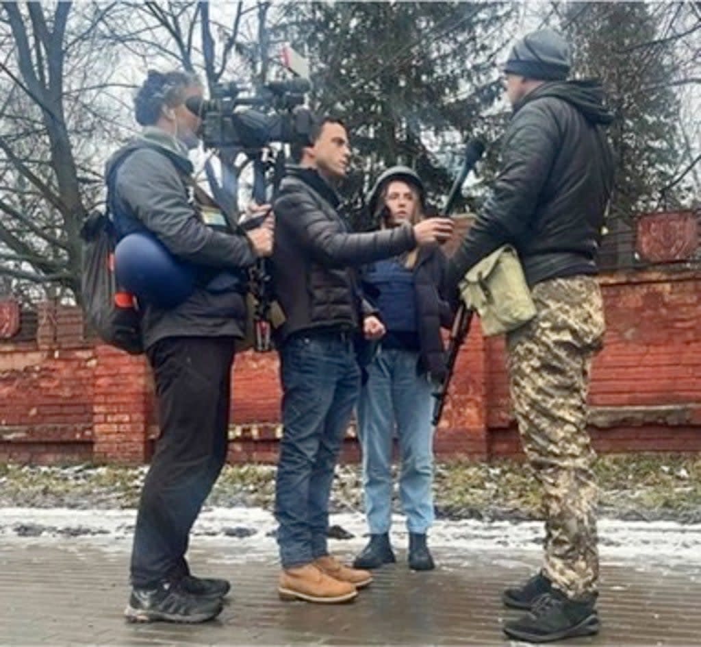 A photo shared by Fox News showing Oleksandra ‘Sasha’ Kuvshynova with Trey Yingst and Pierre Zakrzewski  (Fox News)