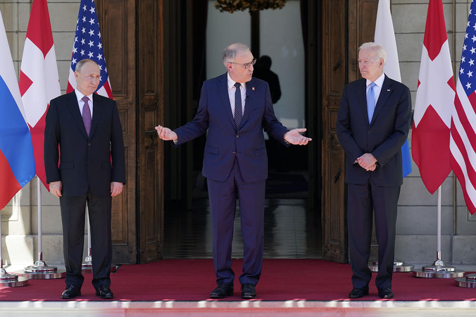 Swiss President Guy Parmelin, center, greets President Joe Biden, right, and Russian President Vladimir Putin, at the 'Villa la Grange', Wednesday, June 16, 2021, in Geneva, Switzerland. 