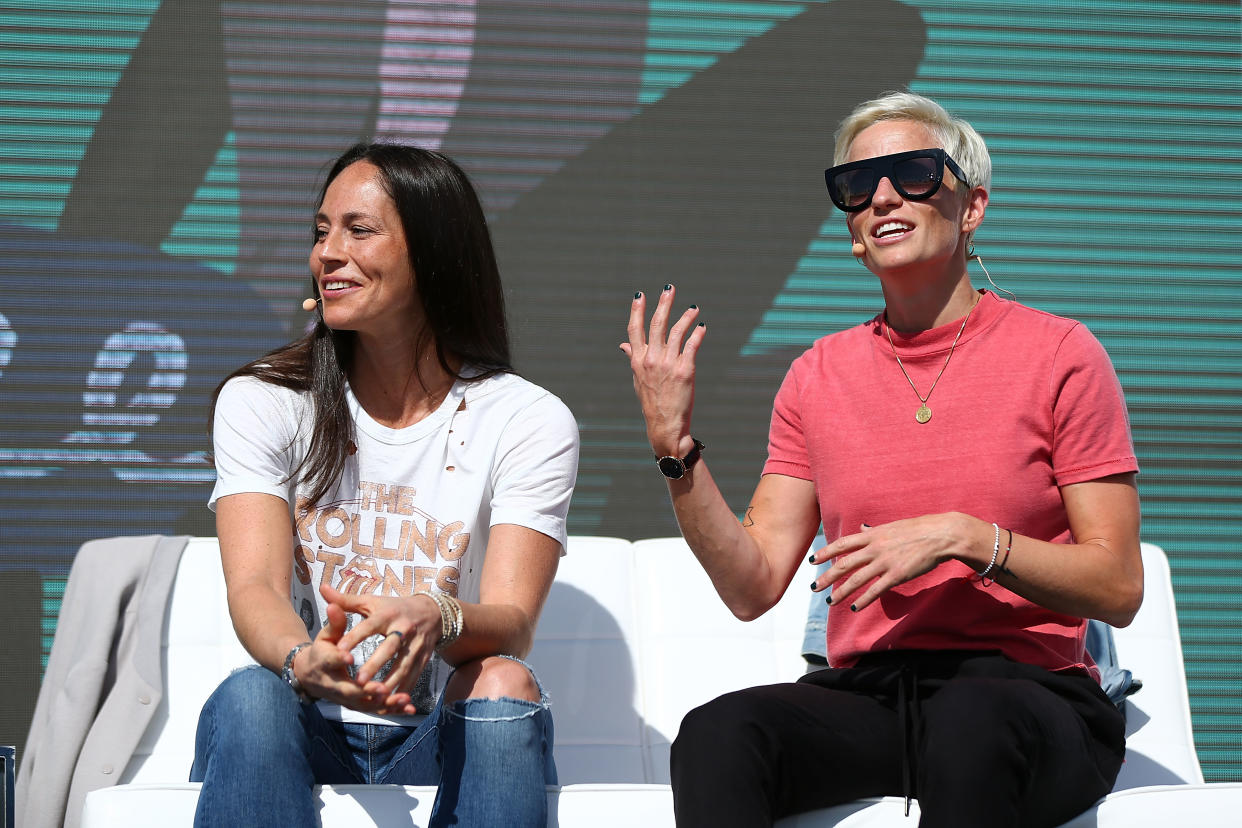 NEWPORT BEACH, CA - OCTOBER 4:  Sue Bird and Megan Rapinoe attend the 8th Annual espnW: Women + Sports Summit at Resort at Pelican Hill on October 4, 2017 in Newport Beach, California. (Photo by Joe Scarnici/Getty Images)