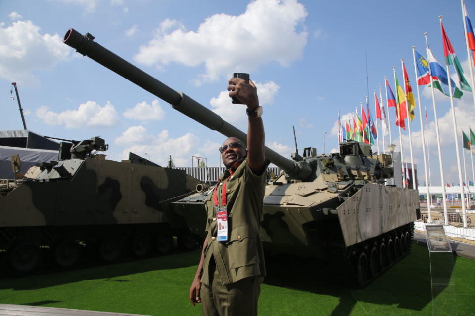 An officer from Uganda poses for a selfie photo in front the 2S25 Sprut-SD ("Kraken SD") self-propelled anti-tank gun during the International Military Technical Forum 'Army 2022', on August 15, 2022, in Kubinka, outside of Moscow, Russia.<span class="copyright">Contributor/Getty Images</span>