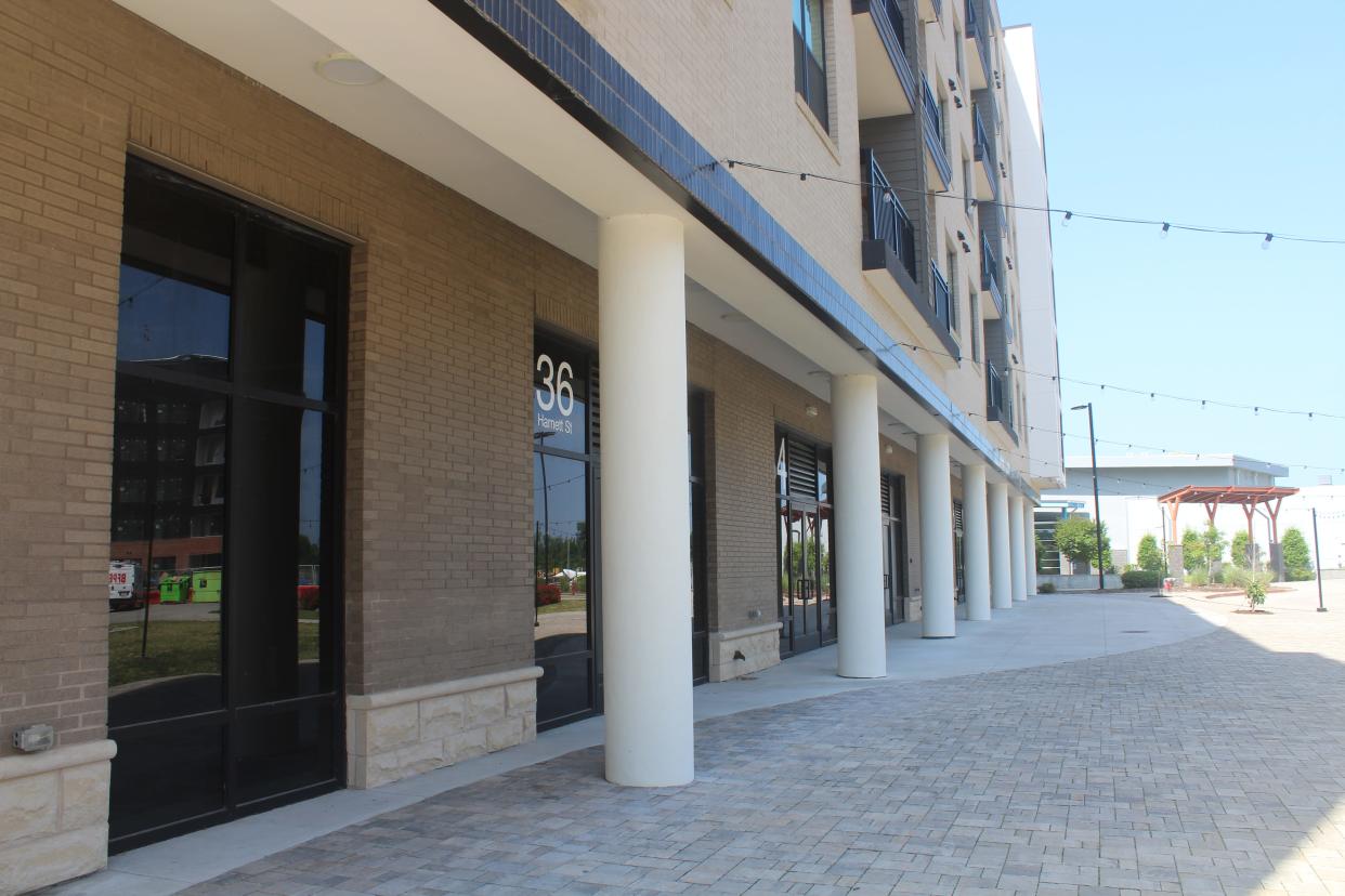 Retail space on the ground floor of apartment complex Pier 33 remains for lease on downtown Wilmington's northern end. Despite a slow start in leasing, the real estate agents say momentum is picking up.