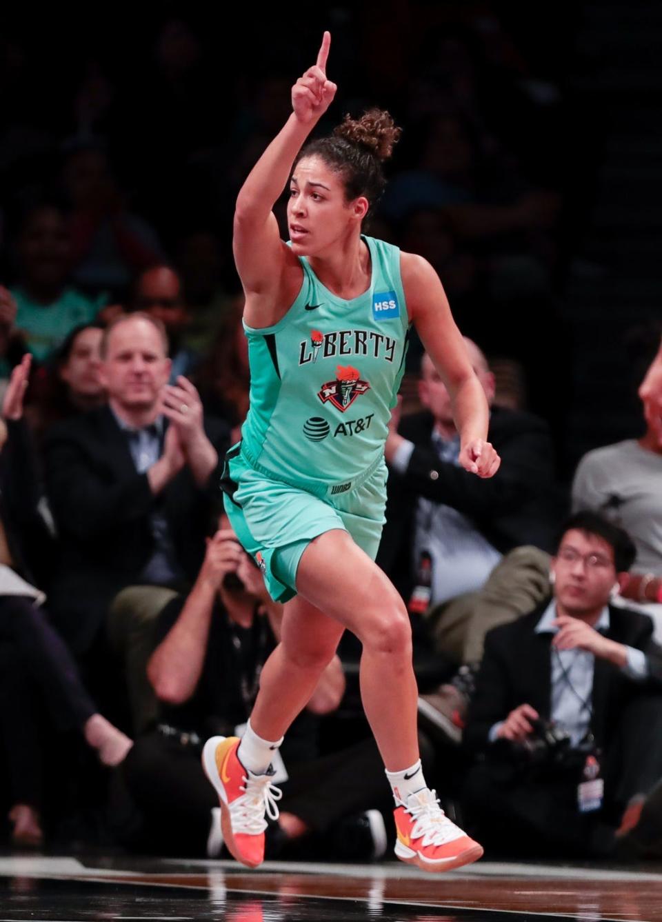 New York Liberty guard Kia Nurse celebrates after hitting a 3-pointer in a 2019 exhibition game.