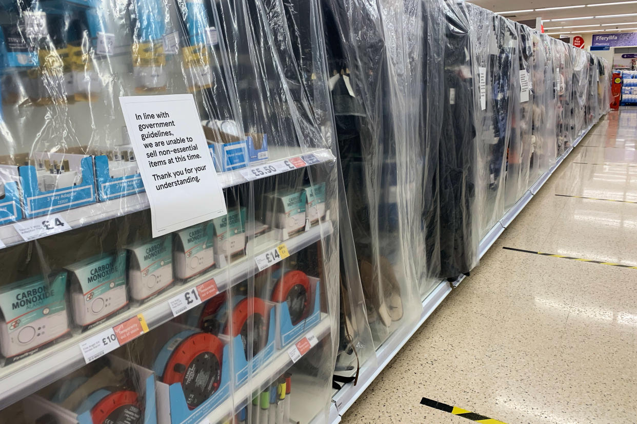 PENARTH, UNITED KINGDOM - OCTOBER 24: Non-essential items such as electricals are covered up in a Tesco store on October 24, 2020 in Cardiff, United Kingdom. Wales entered a national lockdown on Friday evening which will remain in place until November 9. People have been told to stay at home and pubs, restaurants, hotels and non-essential shops must shut. Primary schools will reopen after the half-term break, but only Years 7 and 8 in secondary schools can return at that time under new "firebreak" rules. Gatherings indoors and outdoors with people not in your household are banned. (Photo by Polly Thomas/Getty Images)