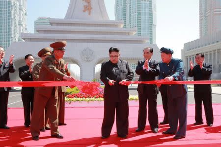 North Korea's leader Kim Jong Un cuts a ribbon during a ceremony in this undated photo released by North Korea's Korean Central News Agency (KCNA) in Pyongyang on April 16, 2017. KCNA/via REUTERS