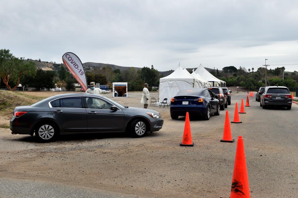 Cars line up at a Thousand Oaks COVID-19 testing site earlier this month.
