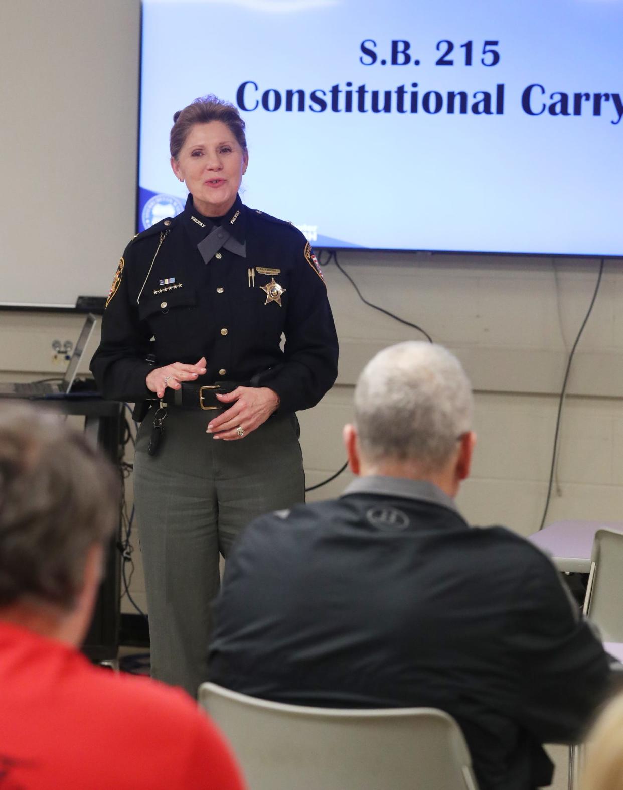 Summit County Sheriff Kandy Fatheree greets attendees at a concealed carry workshop at the Summit County Sheriff's Office Training Center in Green.