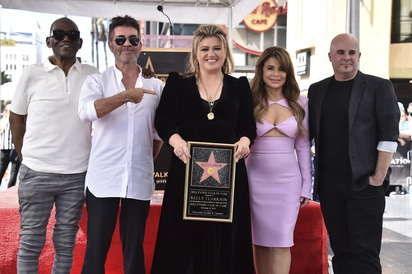 Randy Jackson, Simon Cowell, Kelly Clarkson, Paula Abdul and Jason Halbert at the Hollywood Walk of Fame