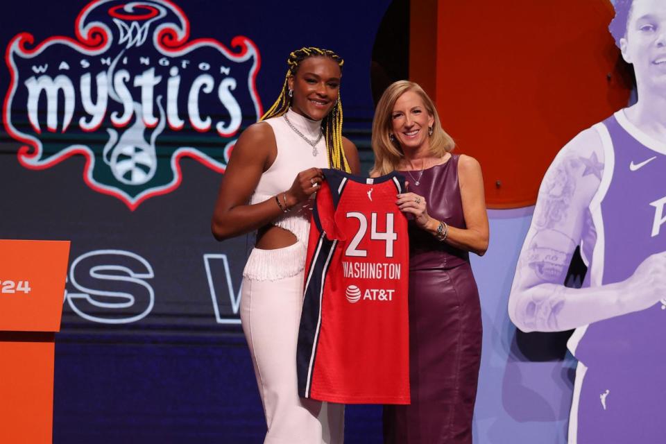 PHOTO: Aaliyah Edwards poses with WNBA commissioner Cathy Engelbert after she is selected with the number six overall pick to the Washington Mystics in the 2024 WNBA Draft at Brooklyn Academy of Music,  April 15, 2024, Brooklyn, New York. (Brad Penner/USA TODAY Sports via Reuters)