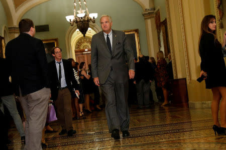 FILE PHOTO: U.S. Sen. Luther Strange (R-AL) walks to the Senate floor following the party luncheons on Capitol Hill in Washington, DC, U.S. on September 19, 2017. REUTERS/Aaron P. Bernstein/File Photo