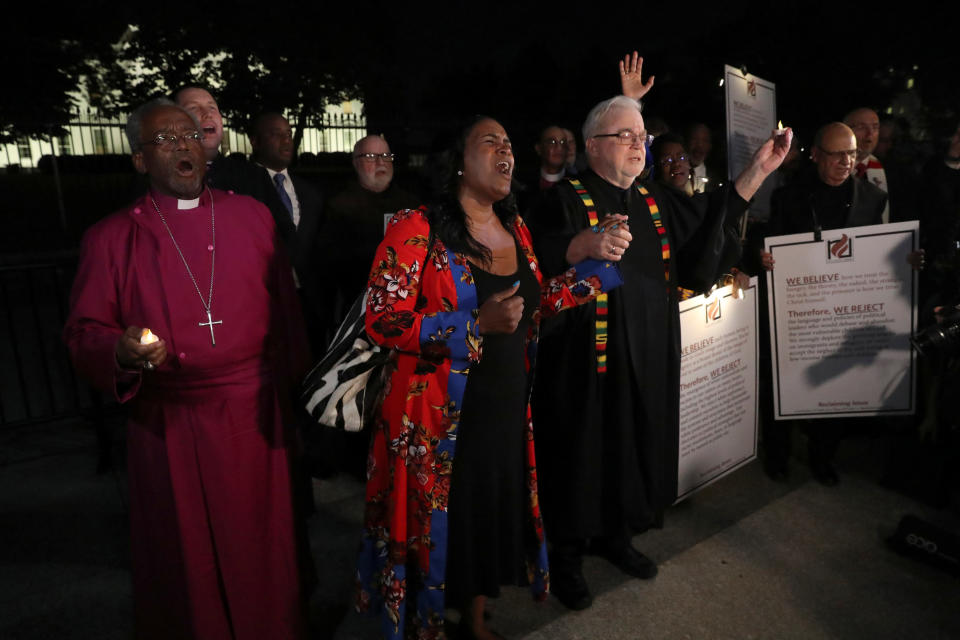 Episcopal Church Presiding Bishop Michael Curry (L) and Sojourners President and Founder Rev. Jim Wallis (R) lead fellow clergy in a vigil. (Photo: Jonathan Ernst / Reuters)