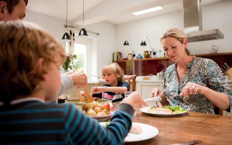 family dinner table - Getty Images