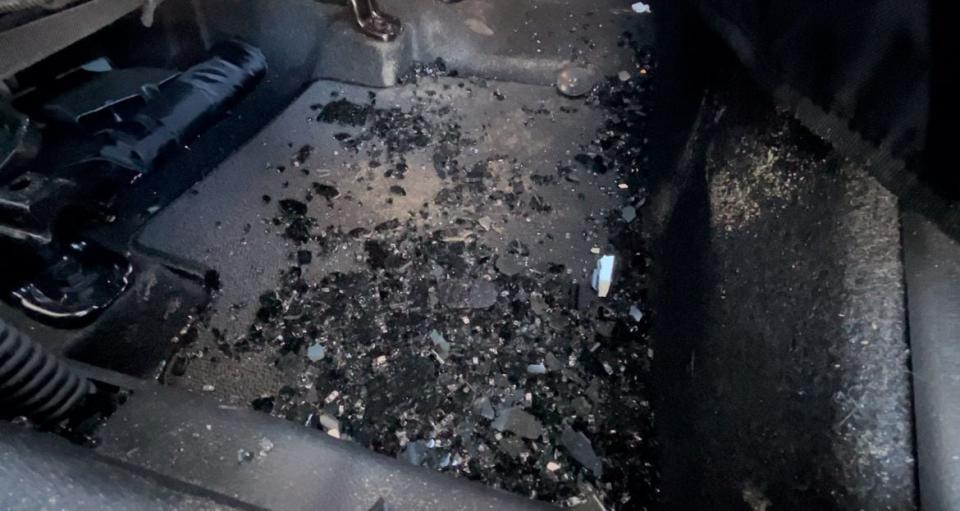 Broken glass in the backseat after someone broken into a Jacksonville woman's KIA.